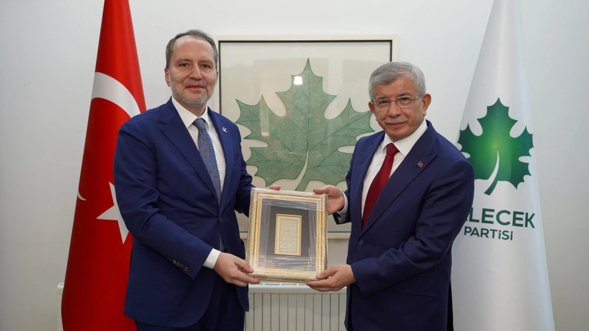 Erbakan’dan Davutoğlu’na ‘hayırlı olsun’ ziyareti